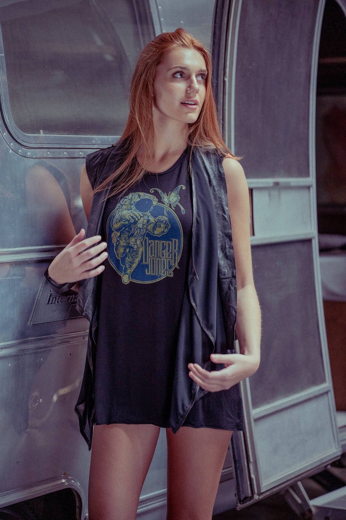 Model standing next to an Airstream wearing a Danger Jones Starrider Tank Dress